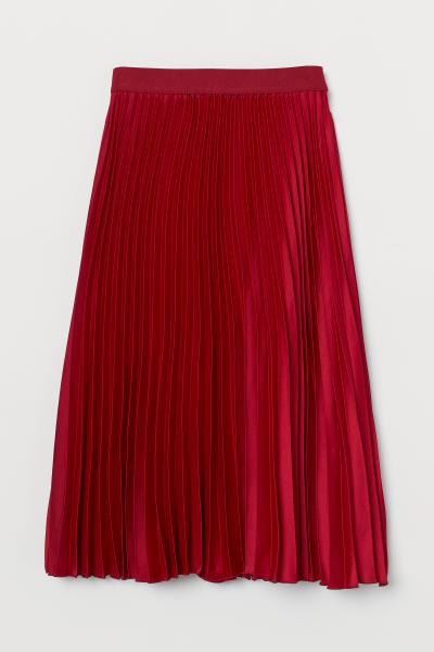 Röd plisserad kjol